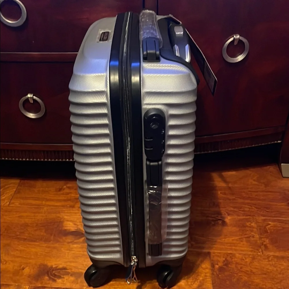 Silver and Black Cylindrical Storage Container with Wheels
